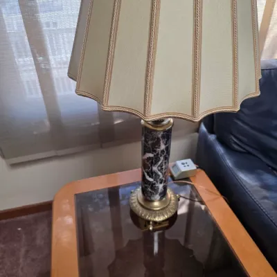 Sale Photo Thumbnail #29: Vintage table lamp featuring a black and white faux-marble column base with brass accents, topped with a pleated beige fabric shade.