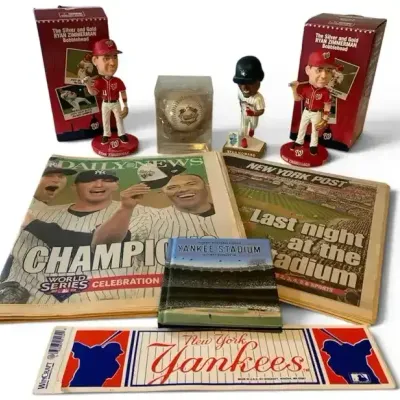 Sale Photo Thumbnail #12: New York Yankees Memorabilia Lot – 3 Figurines, Baseball, Pennant & Vintage Publications