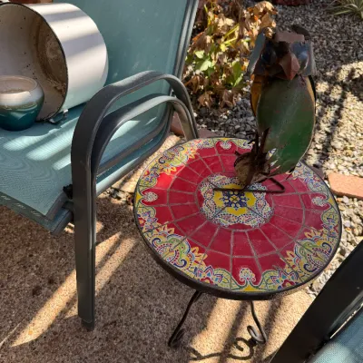 Sale Photo Thumbnail #90: outside mosaic table and metal sculpture