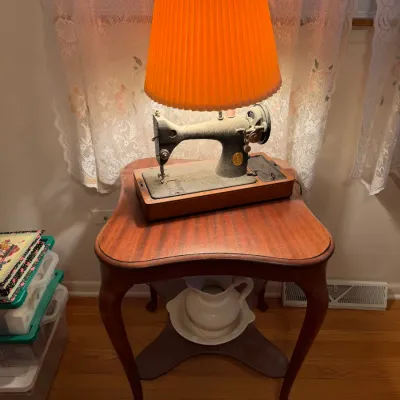 Sale Photo Thumbnail #22: mahogany-finish side table with cabriole legs.