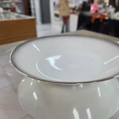 Sale Photo Thumbnail #31: Noritake white porcelain bowl with a silver rim and a subtle grey gradient border, displayed on a mirrored surface.