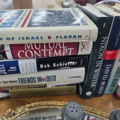 Sale Photo Thumbnail #28: A collection of hardcover non-fiction books, primarily focusing on history, politics, and biography, showing some shelf wear.