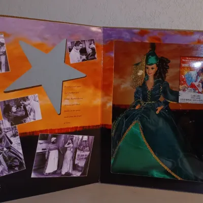 Sale Photo Thumbnail #19: Vintage Gone with the Wind Scarlett O'Hara Barbie doll in original display packaging, featuring her iconic green velvet drapery dress.