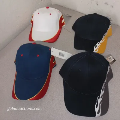 Sale Photo Thumbnail #41: Four new-with-tags baseball caps featuring flame designs in various color combinations, including white/red, navy/red, black/yellow, and black/grey.