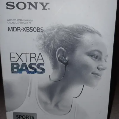 Sale Photo Thumbnail #42: Sony MDR-XB50BS Extra Bass sports wireless stereo headset in its original retail packaging.