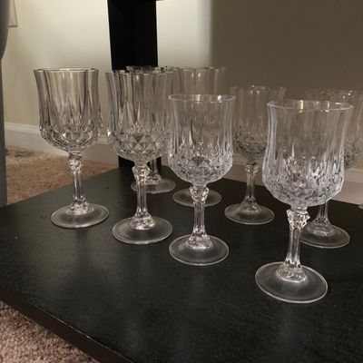 Sale Photo Thumbnail #3: Set of vintage crystal wine goblets featuring a diamond-cut pattern on the lower bowl and a faceted stem.