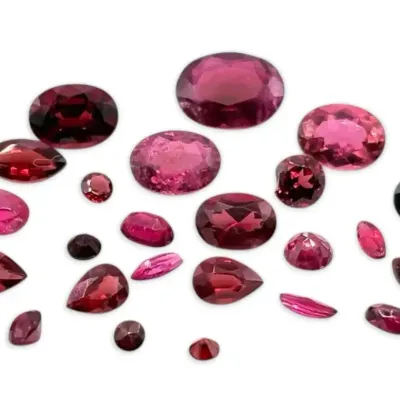 24 loose garnets of various shapes sizes 15ct total