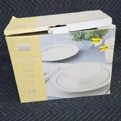 Martha Stewart Everyday 16-piece dinnerware set in its original box, showing some wear on the packaging.