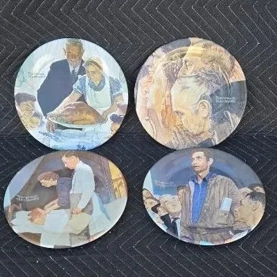 Set of four Norman Rockwell "Four Freedoms" collector plates, featuring Freedom from Want, Freedom of Worship, Freedom from...