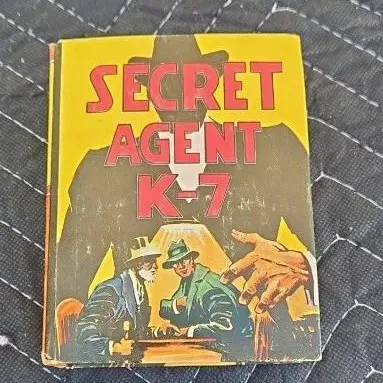 Vintage Big Little Book titled "Secret Agent K-7", featuring a colorful illustrated cover with some edge wear.