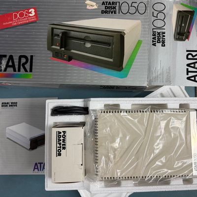 Sale Photo Thumbnail #5: Vintage Atari 1050 Disk Drive, complete in box with original packaging, power adapter, cables, and owner's guide.