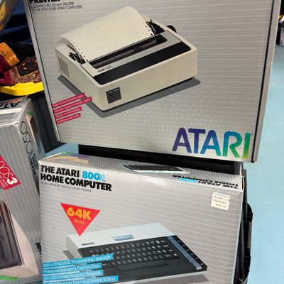 Sale Photo Thumbnail #3: Vintage Atari 800XL Home Computer and Atari 1025 Printer, both in their original retail boxes from the 1980s.