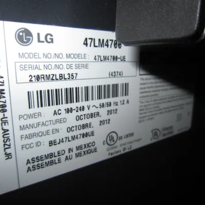 Manufacturer's label on the back of an LG television, model number 47LM4700-UE, manufactured in October 2012.