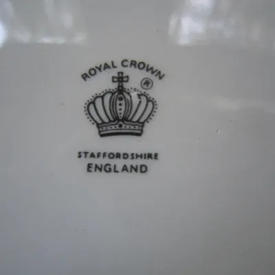 Royal Crown Staffordshire England maker's mark stamped on the underside of a white ceramic piece.