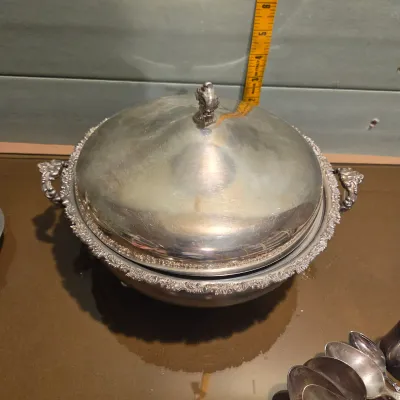 Sale Photo Thumbnail #72: Handful of interesting silver plate / stainless, the casserole is particularly pretty with a secondary removable band, couple smallish platters and some napkin rings