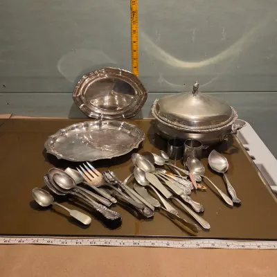 Sale Photo Thumbnail #67: Handful of interesting silver plate / stainless, the casserole is particularly pretty with a secondary removable band, couple smallish platters and some napkin rings