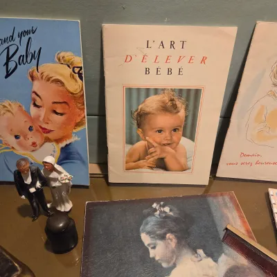 Sale Photo Thumbnail #157: Check out the parenting booklets. Cute lot of misc stuff. Brass mini brush I think might be for photography but it is sweet