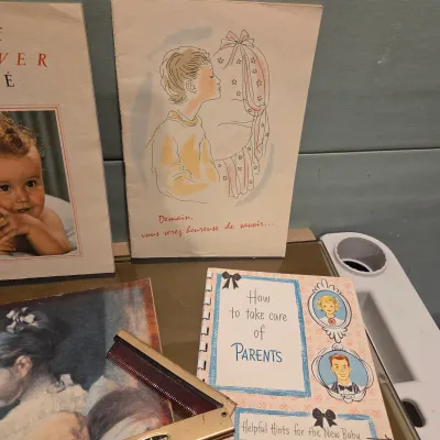Sale Photo Thumbnail #159: Check out the parenting booklets. Cute lot of misc stuff. Brass mini brush I think might be for photography but it is sweet