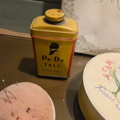 Sale Photo Thumbnail #5: Sweet lot including a gorgeous cut ruby flashed powder box, a pincushion and thimble and other vintage vanity type items