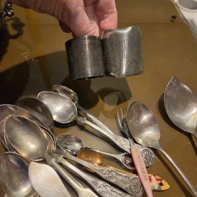 Sale Photo Thumbnail #77: Handful of interesting silver plate / stainless, the casserole is particularly pretty with a secondary removable band, couple smallish platters and some napkin rings