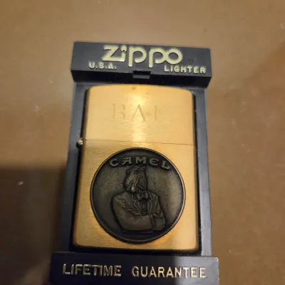 Sale Photo Thumbnail #142: Lot of misc stuff including cast iron pan ashtray, vintage sunglasses and a pair of new in package Camel branded zippo lighters