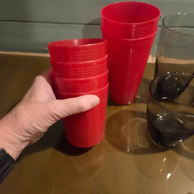 Sale Photo Thumbnail #28: Misc lot of yellow fiesta, great red wine goblets, set of smoke glasses and red plastic cups