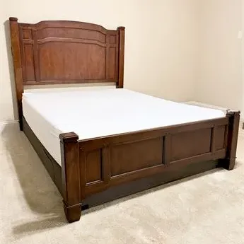 Sale Photo Thumbnail #22: Traditional style dark wood queen-size bed frame featuring a paneled headboard and footboard with square posts.