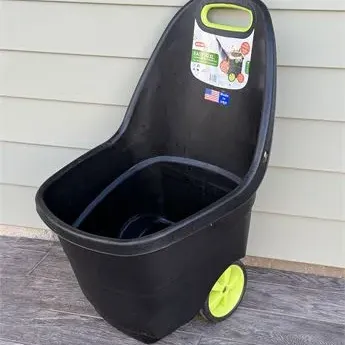Sale Photo Thumbnail #52: Keter Easy Go XXL black plastic rolling garden cart with lime green wheels and handle grip, in excellent, lightly used condition.