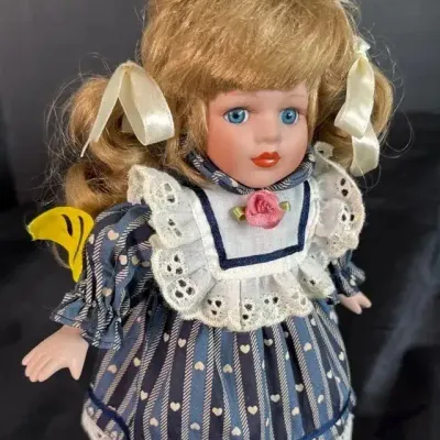 Vintage Porcelain Collector Doll in Blue and White Heart Striped Dress