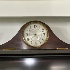 Sale Photo Thumbnail #49: Vintage Sessions tambour mantel clock featuring a dark wood case, brass bezel, and Arabic numerals.