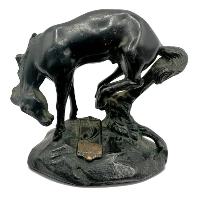 Sale Photo Thumbnail #90: Vintage 1933 Chicago World's Fair 'A Century of Progress' cast metal bucking horse souvenir statue with a dark patina.