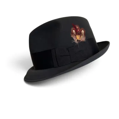 Sale Photo Thumbnail #169: Vintage black felt fedora hat featuring a wide black grosgrain ribbon band with a bow and a decorative feather accent.