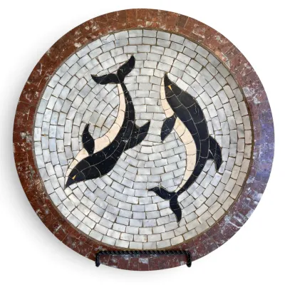 Sale Photo Thumbnail #14: Circular stone mosaic plaque depicting two killer whales swimming in a circle, framed by a reddish-brown marble border.