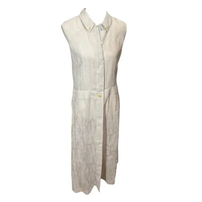 Sale Photo Thumbnail #170: Chanel Sleeveless linen maxi dress in a light beige or off-white hue, featuring a button-down front, pointed collar, and a relaxed, straight silhouette.