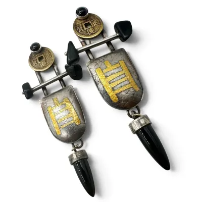 Sale Photo Thumbnail #144: Pair of vintage Asian-inspired mixed metal dangle earrings featuring Chinese cash coins, gold-tone accents, and black onyx-style cabochons and drops.