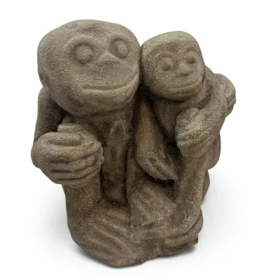 Sale Photo Thumbnail #53: Carved stone sculpture depicting two stylized monkey figures embracing, featuring a textured, weathered finish.