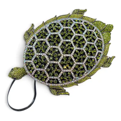 Sale Photo Thumbnail #158: Whimsical turtle-shaped evening clutch bag, heavily embellished with green and iridescent rhinestones.
