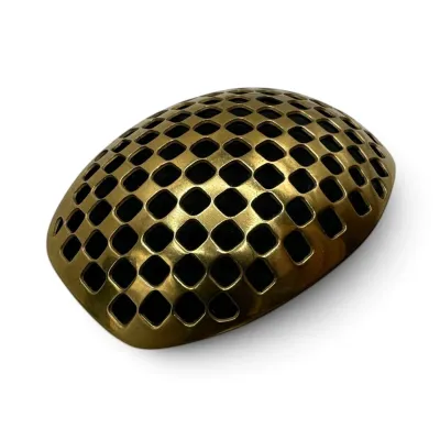 Sale Photo Thumbnail #127: Vintage brass hair receiver or decorative frog lid with a lattice pattern, showing a warm patina.