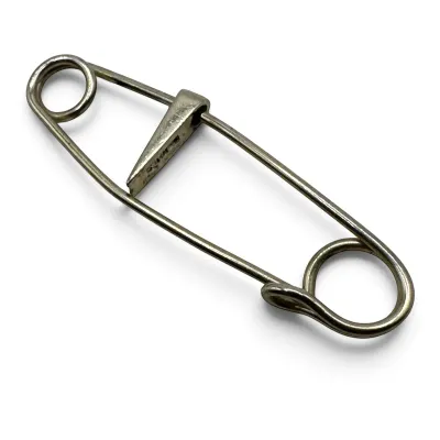 Sale Photo Thumbnail #150: Vintage Hermes sterling silver safety pin brooch, featuring a classic utilitarian design with a polished finish.