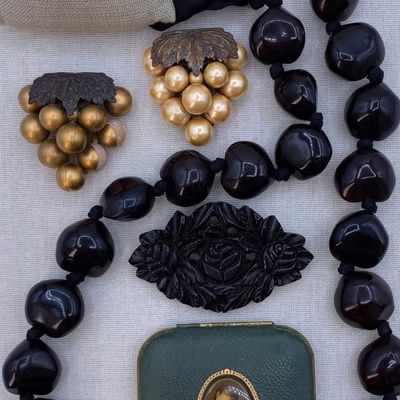 Sale Photo Thumbnail #166: 6 pc Art Deco Bakelite Brooch, Dress Clips, Damascene Style Bangle, Kukui Nut, Mondaine Compact