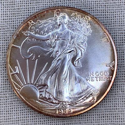 Sale Photo Thumbnail #15: Toned Brilliant Uncirculated 1989 American Eagle Silver Dollar Coin