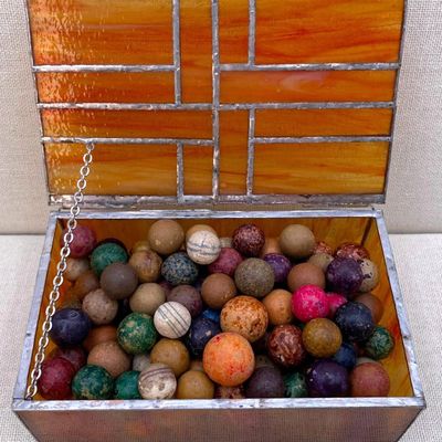 Sale Photo Thumbnail #165: 127 Antique Clay Marbles in Artisan Made Amber Slag Glass Box