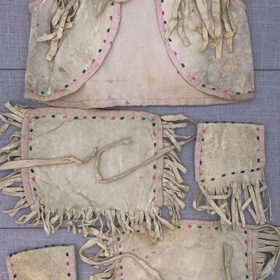 Sale Photo Thumbnail #91: Antique Native American Plains Indian Child Size Beaded Hide Vest, Fringed Panels & Wrist Cuffs