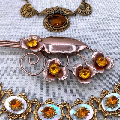 Sale Photo Thumbnail #306: 3 pc 1920s to Mid Century Honey Amber Hued Jewelry Collection
