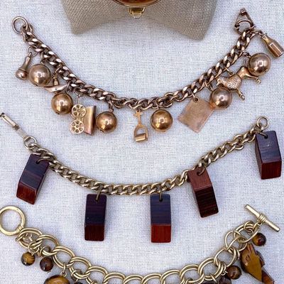 Sale Photo Thumbnail #270: 4 Vintage Carved Animal Totem Tigers Eye, Wood, Gilded Metal Charm and Cuff Bracelets