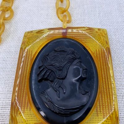 Sale Photo Thumbnail #66: 1920s Oversize Apple Juice Celluloid Oval Link Chain Raven Bakelite Cameo Necklace