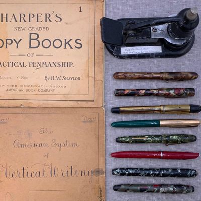 Sale Photo Thumbnail #233: 1887, 1894 Writing Books, Antique Draftsman's Inkwell and Fountain Pen Writing Instrument Collection