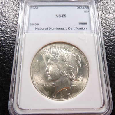 1923 NNC MS-65 PEACE SILVER DOLLAR