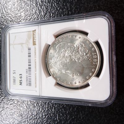 1887 NGC MS63 MORGAN SILVER DOLLAR