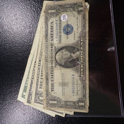 GROUP OF 4 $1 STAR NOTES ONE IS A SILVER CERTIFICATE